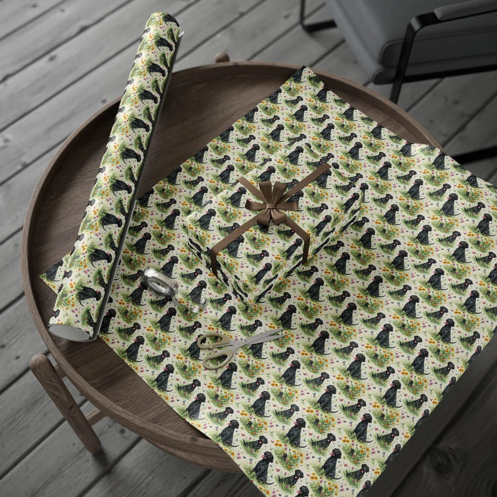 Black Lab in Bloom: Black Labrador Wrapping Paper — gift wrapping presented on a wooden table