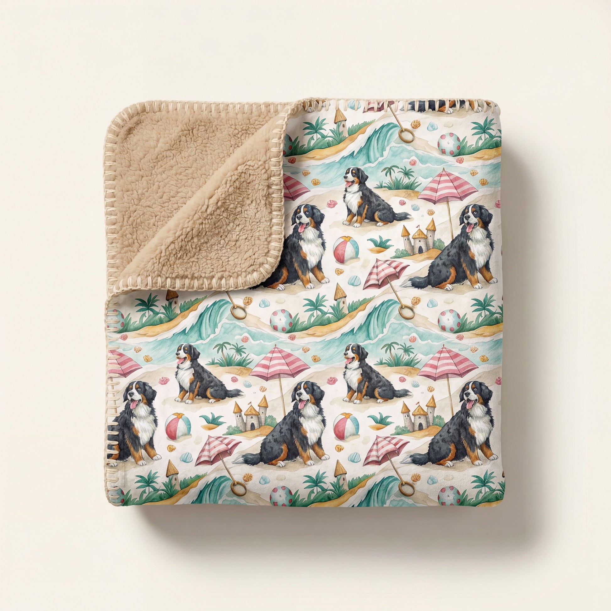 Top-down product photo of the Bernese Mountain Dog Beach Day sherpa blanket folded on a cream background