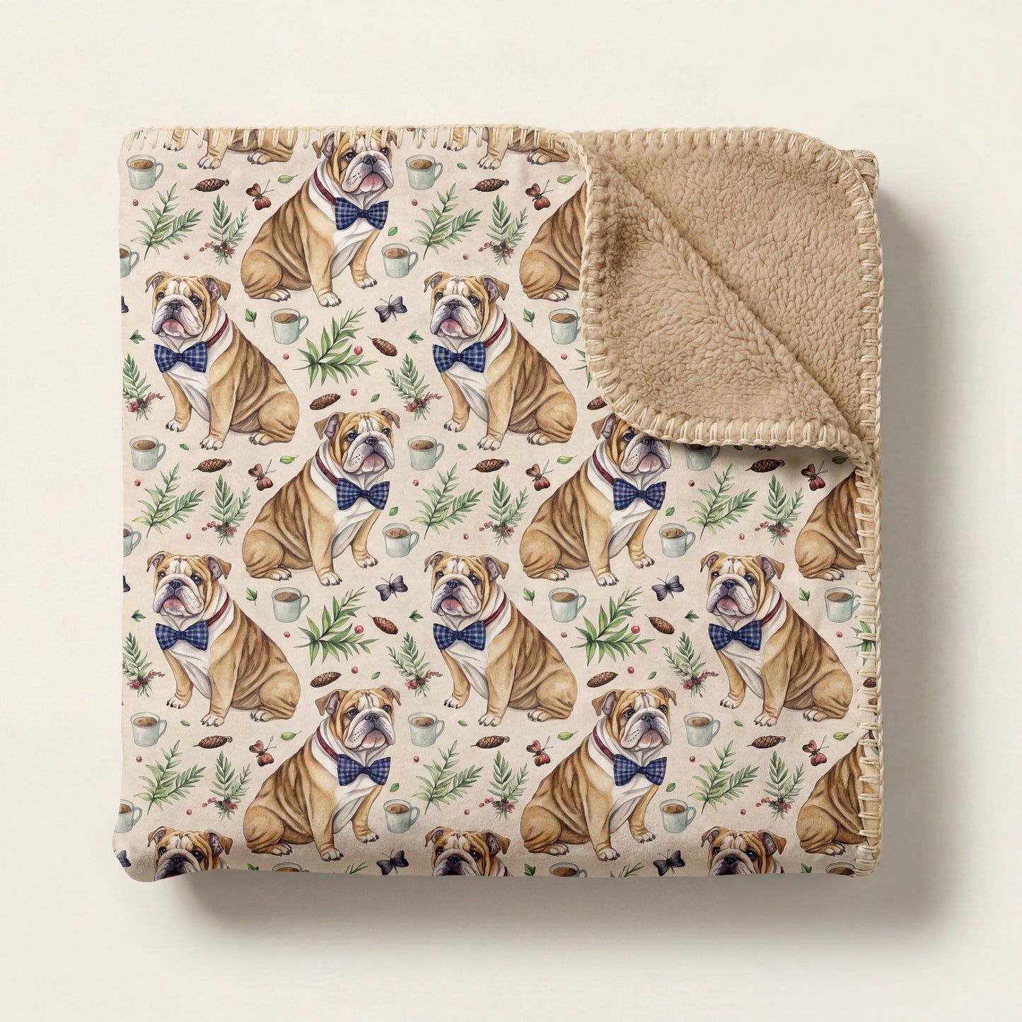 Top-down product photo of the Dapper English Bulldog sherpa blanket folded on a cream background