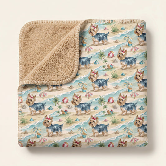 Top-down product photo of the Yorkshire Terrier Beach Day sherpa blanket folded on a cream background
