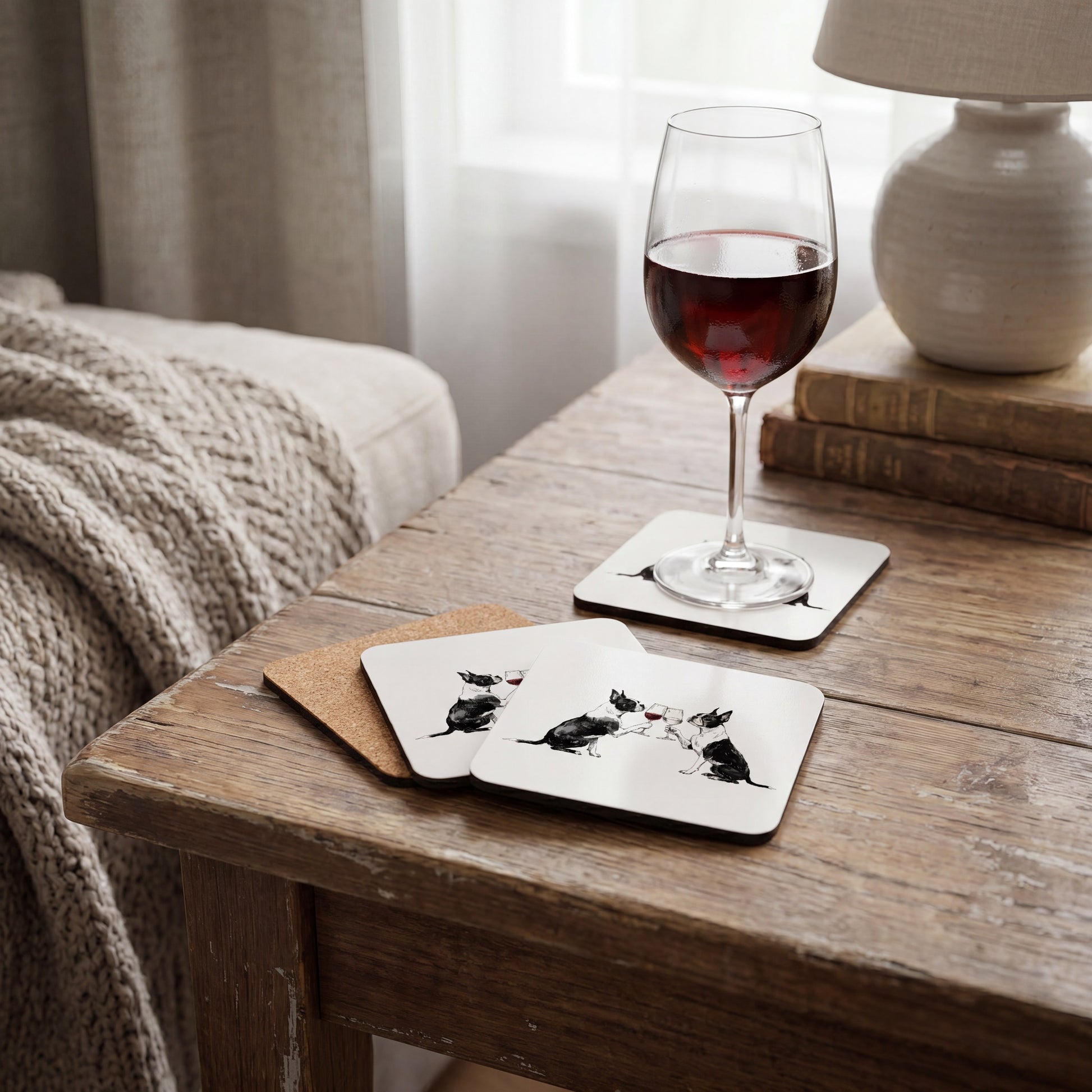 Boston Terrier Happy Hour coaster set styled on a table