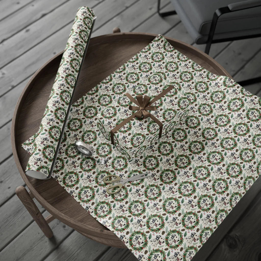 Dalmatian Christmas Wrapping Paper — gift wrapping presented on a wooden table