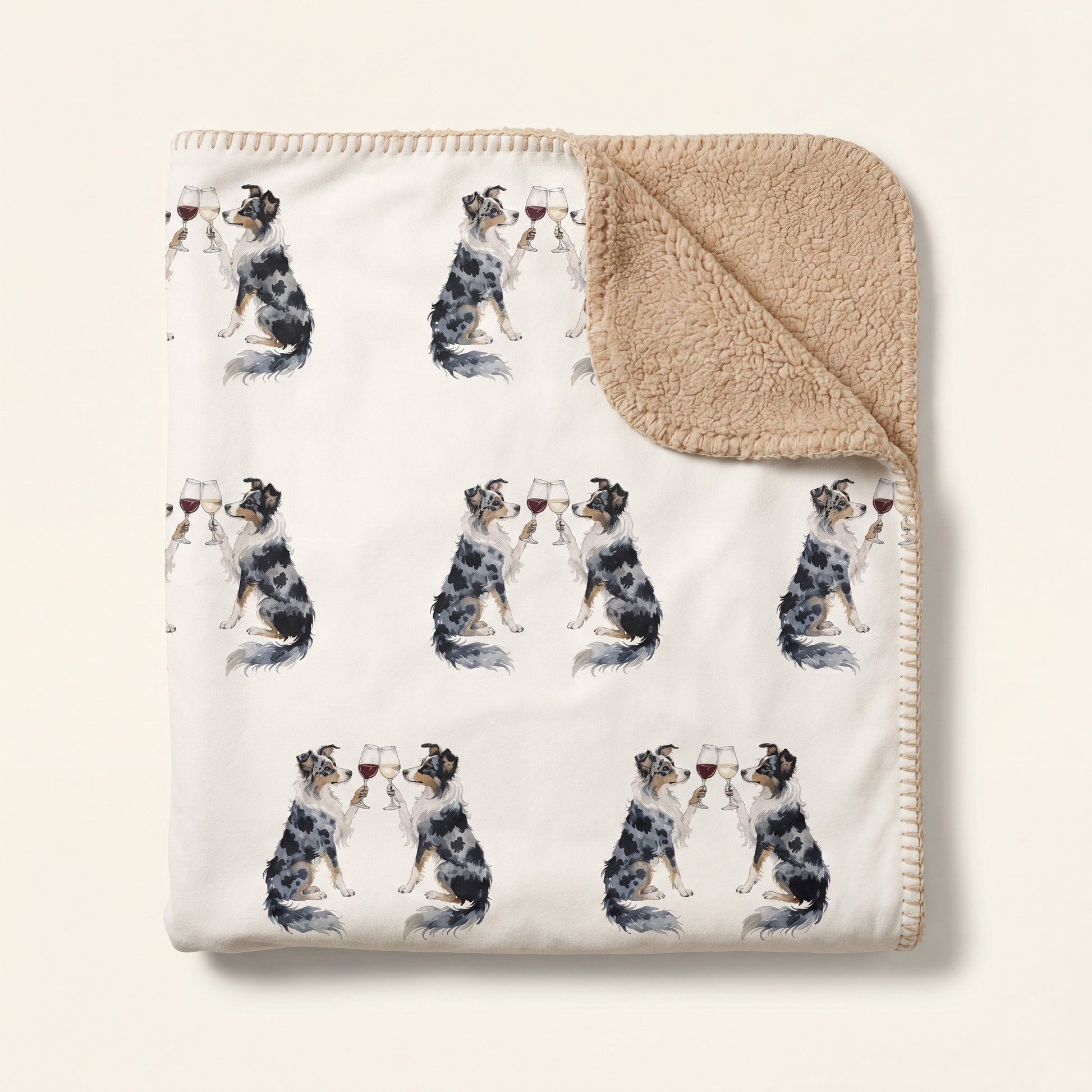 Top-down product photo of the Happy Hour Australian Shepherd sherpa blanket folded on a cream background