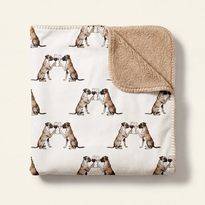 Top-down product photo of the Happy Hour Boxer sherpa blanket folded on a cream background