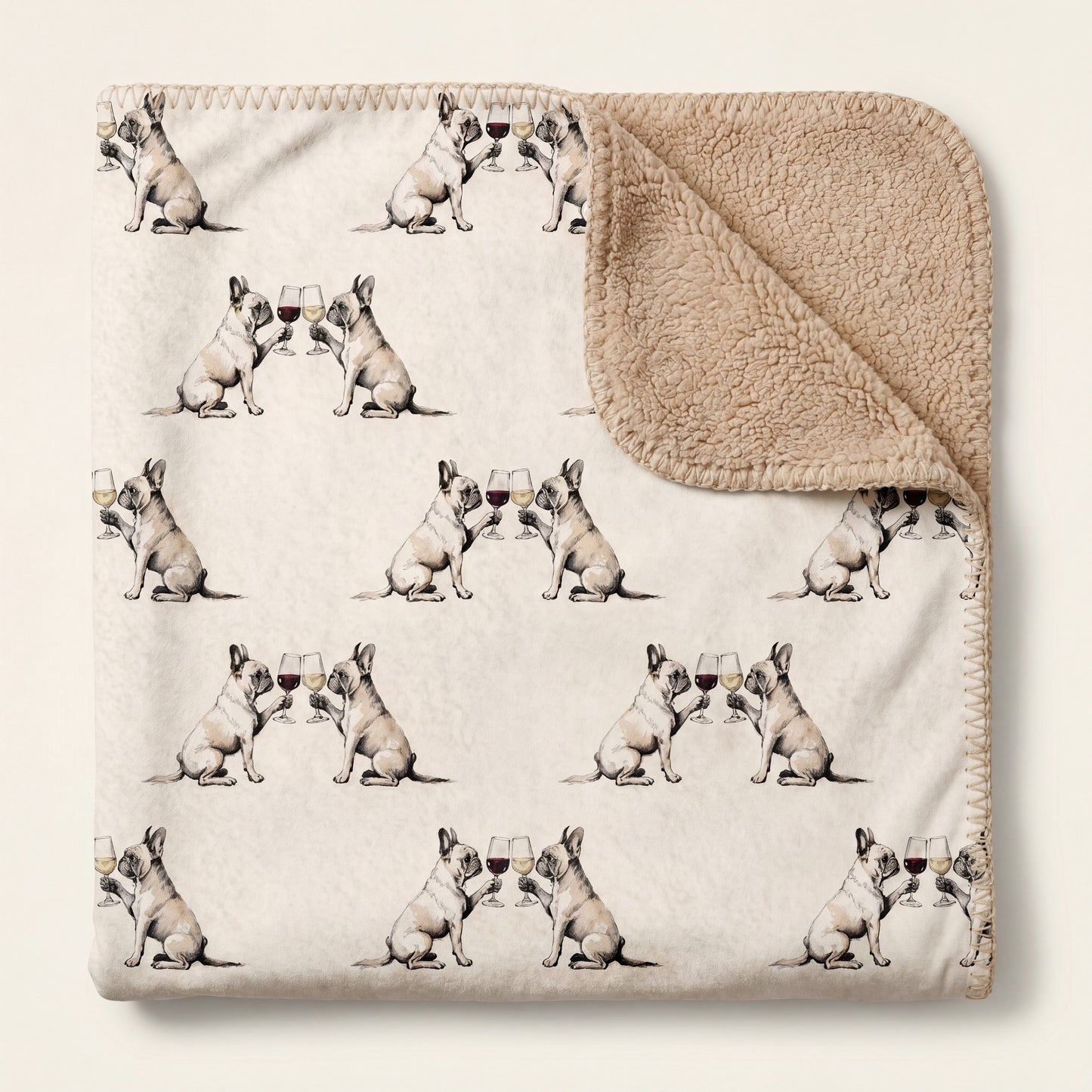 Top-down product photo of the Happy Hour French Bulldog sherpa blanket folded on a cream background