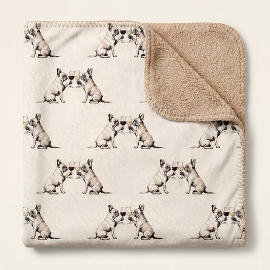 Top-down product photo of the Happy Hour French Bulldog sherpa blanket folded on a cream background