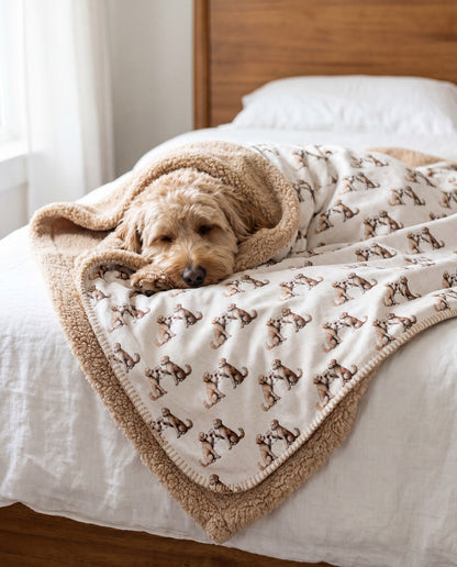Goldendoodle curled asleep in a Happy Hour Goldendoodle sherpa blanket on a bed