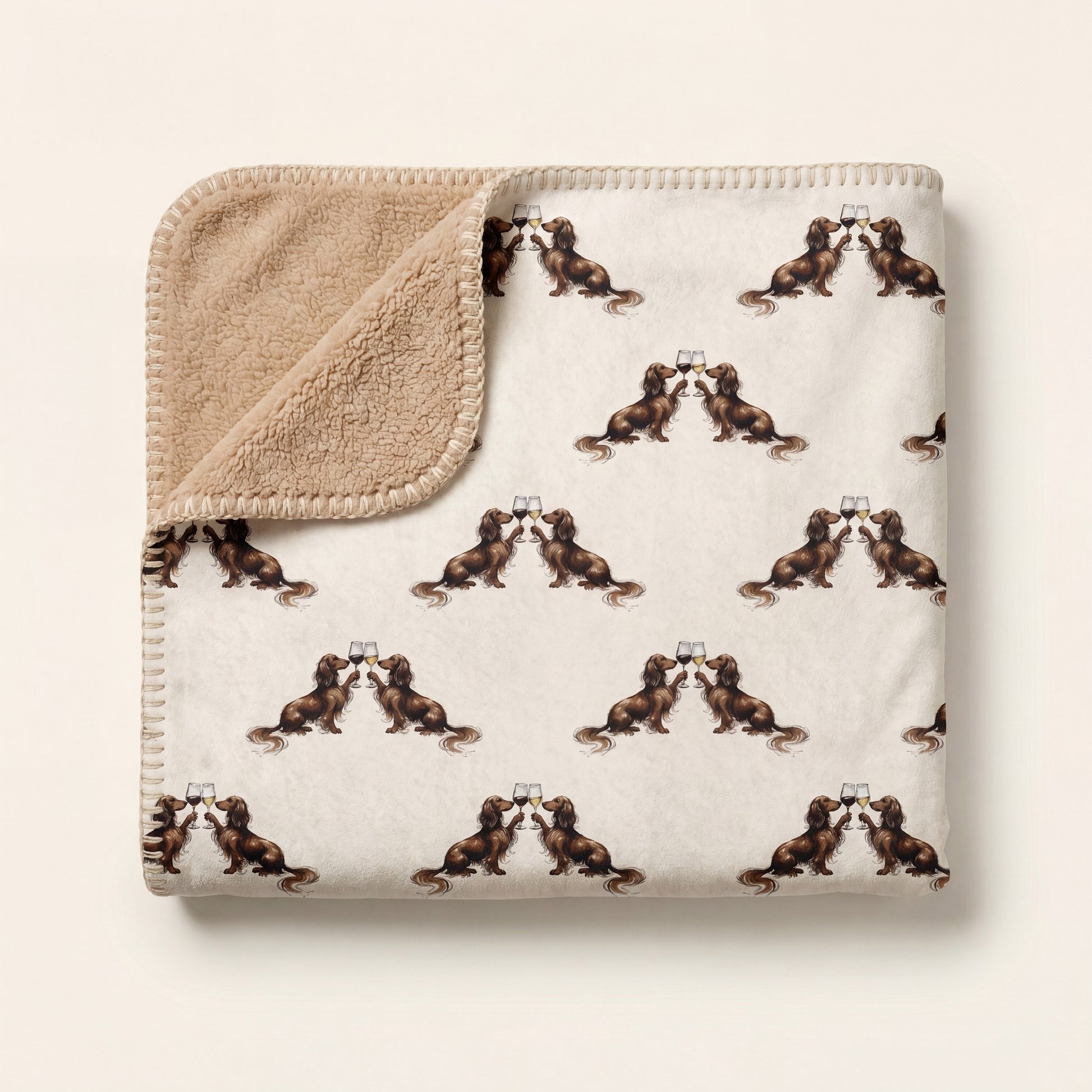 Top-down product photo of the Happy Hour Long-Haired Dachshund sherpa blanket folded on a cream background
