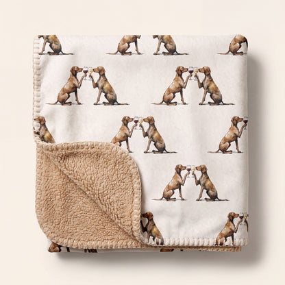 Top-down product photo of the Happy Hour Vizsla sherpa blanket folded on a cream background