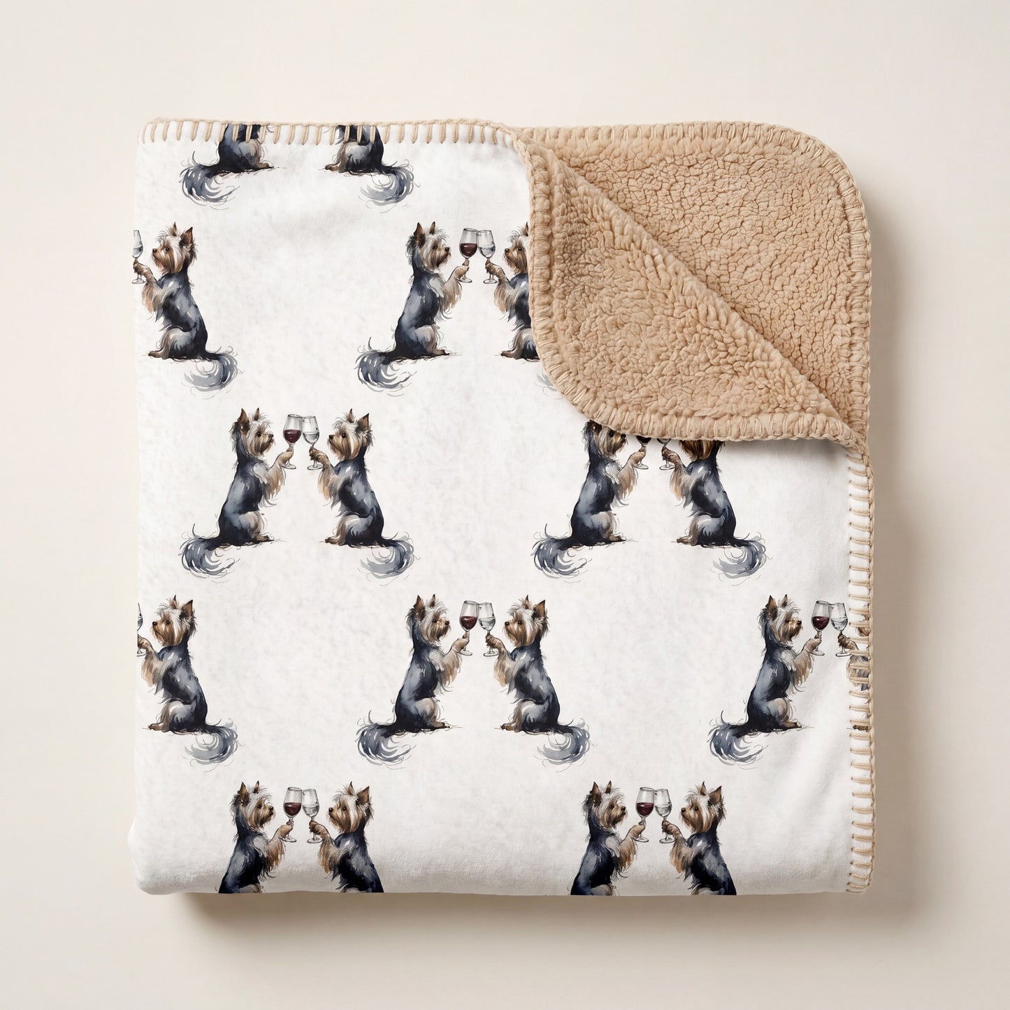 Top-down product photo of the Happy Hour Yorkshire Terrier sherpa blanket folded on a cream background