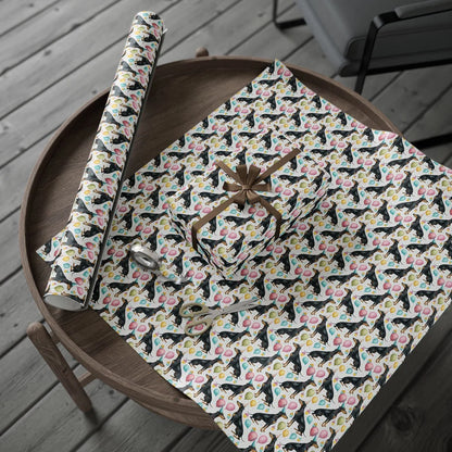 Party Doberman Birthday Wrapping Paper — gift wrapping presented on a wooden table