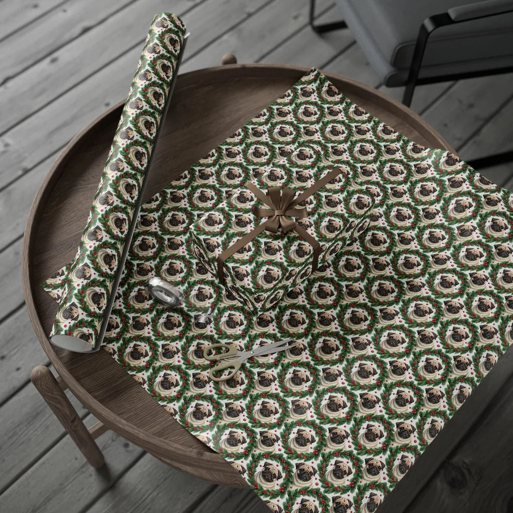 Pug Christmas Wrapping Paper — Holly Wreath Pattern — gift wrapping presented on a wooden table