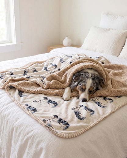 Australian Shepherd curled asleep in a Happy Hour Australian Shepherd sherpa blanket on a bed