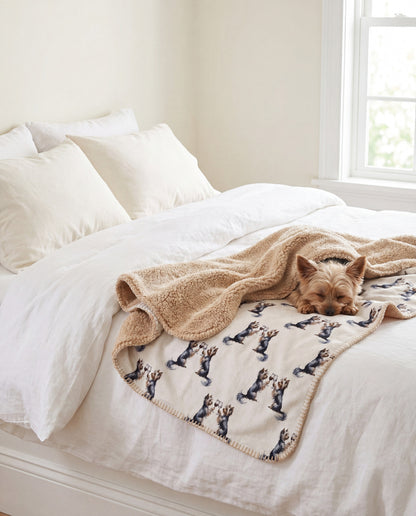 Yorkshire Terrier curled asleep in a Happy Hour Yorkshire Terrier sherpa blanket on a bed