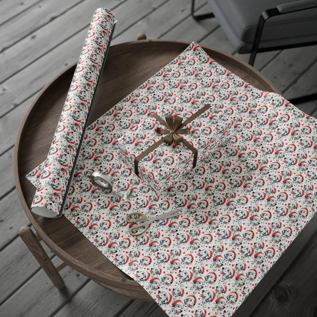 Spotty Santa: Dalmatian Christmas Wrapping Paper — gift wrapping presented on a wooden table
