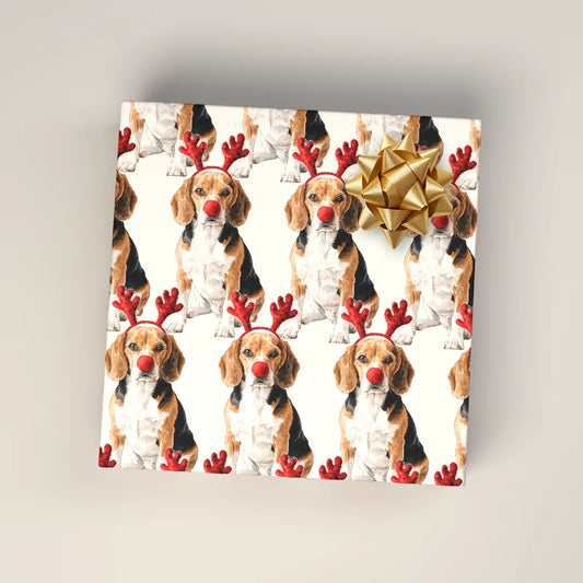 Reindog Beagle Wrapping Paper on a wrapped gift box