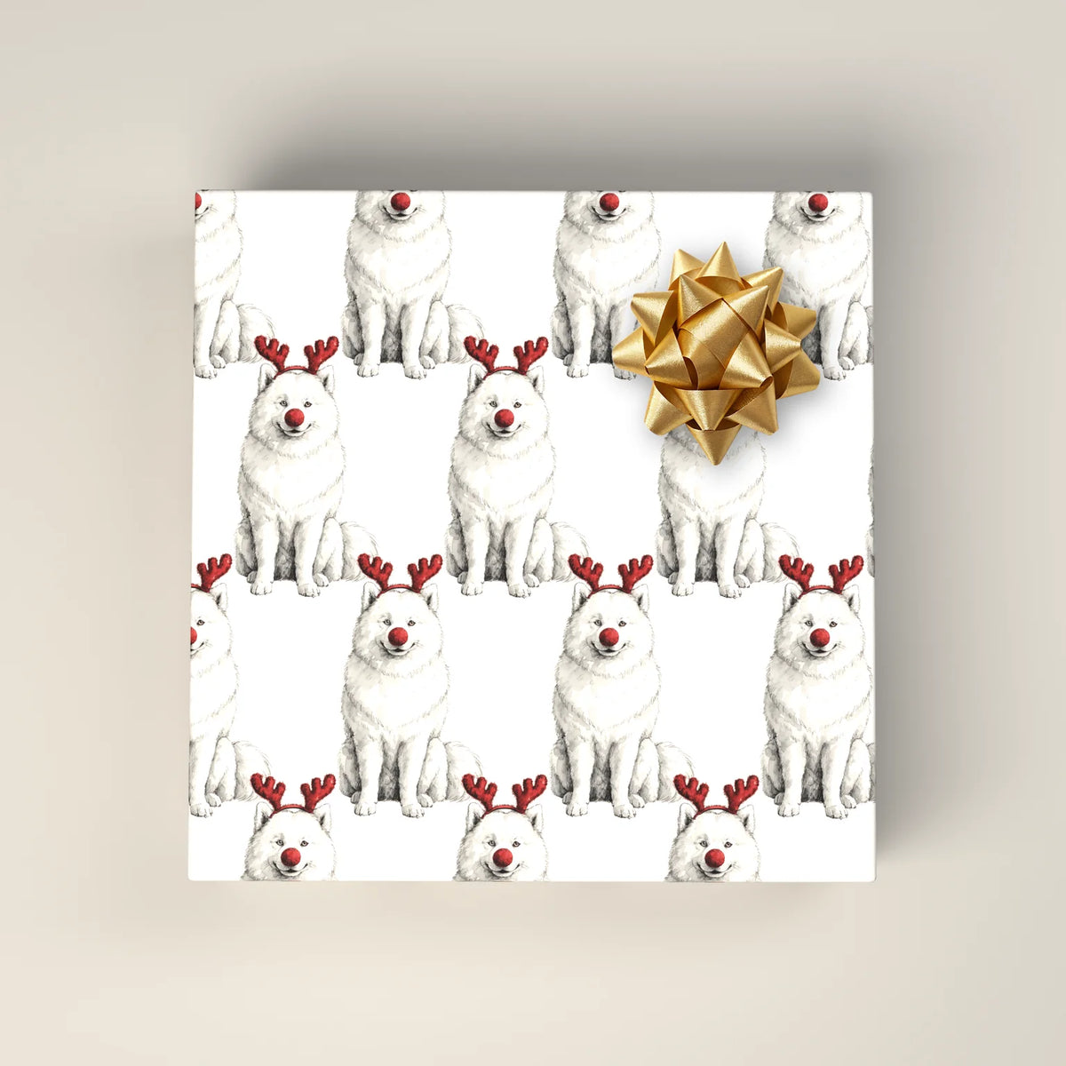 Reindog Samoyed Wrapping Paper on a wrapped gift box